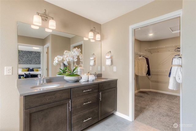 bathroom with vanity and tile patterned floors