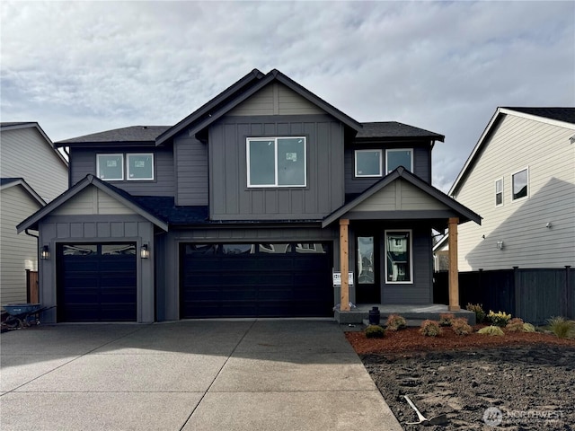 view of front of home featuring a garage and a porch