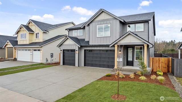 view of front facade featuring board and batten siding, concrete driveway, fence, and a garage