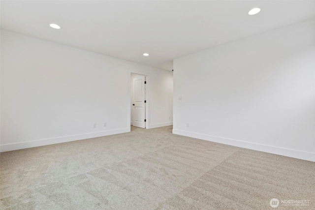 unfurnished room with recessed lighting, carpet flooring, and baseboards