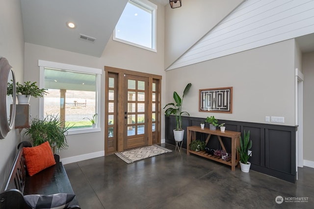 entryway featuring a high ceiling