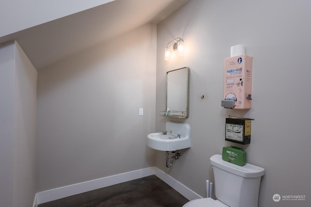 bathroom with sink and toilet