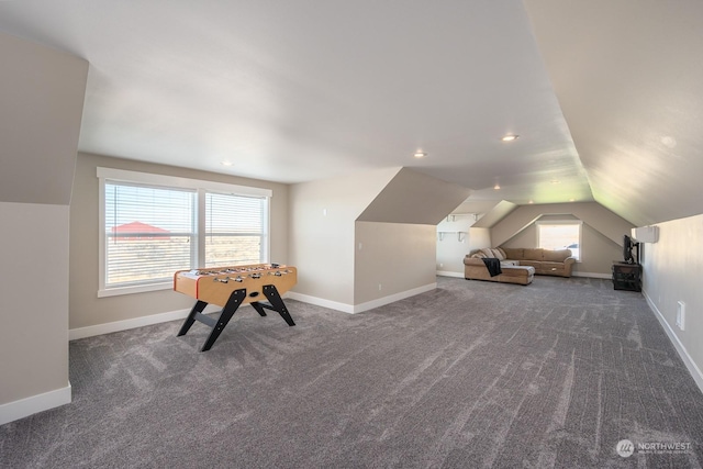 playroom with carpet and lofted ceiling