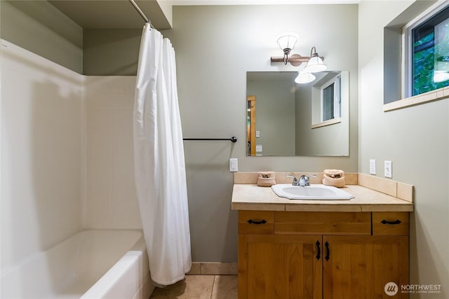 full bath with vanity, shower / bath combination with curtain, and tile patterned flooring