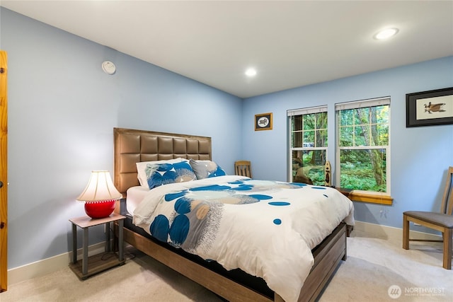 bedroom featuring recessed lighting, baseboards, and carpet