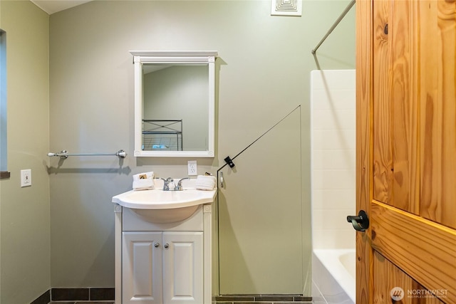 full bathroom featuring visible vents, vanity, and shower / bathtub combination