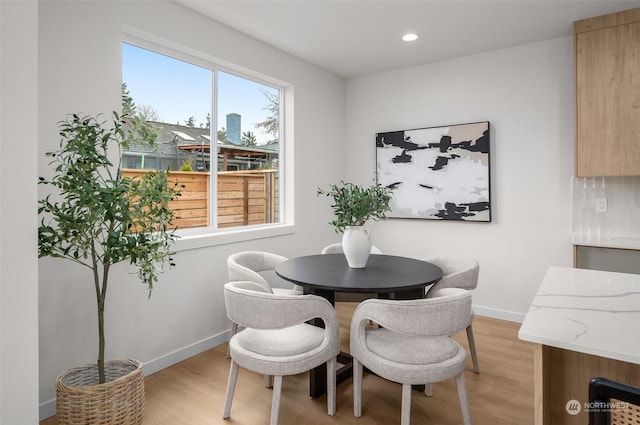 dining area featuring light hardwood / wood-style floors