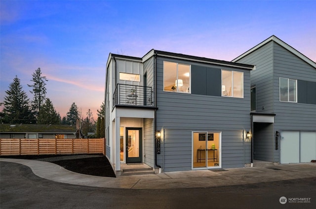 contemporary house featuring a balcony