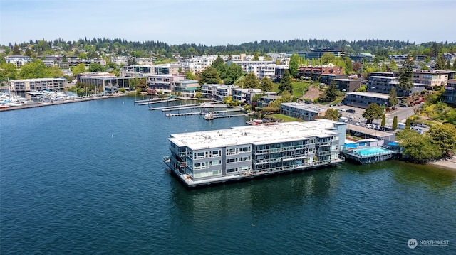 birds eye view of property featuring a water view