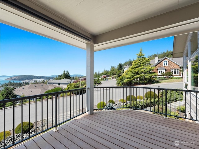 wooden deck with a mountain view