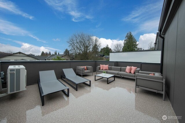 view of patio / terrace featuring an outdoor hangout area and a balcony