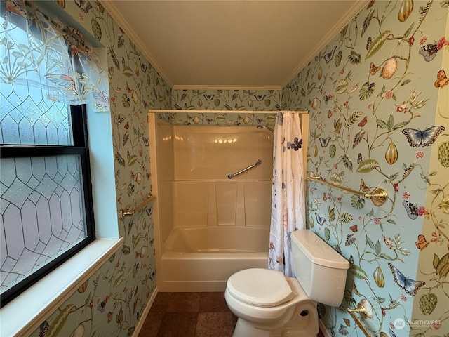 bathroom with crown molding, shower / tub combo with curtain, and toilet