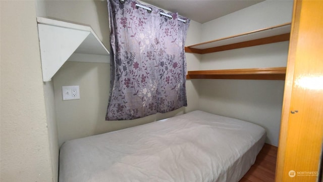 bedroom featuring hardwood / wood-style floors