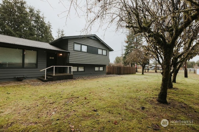 view of home's exterior featuring a lawn