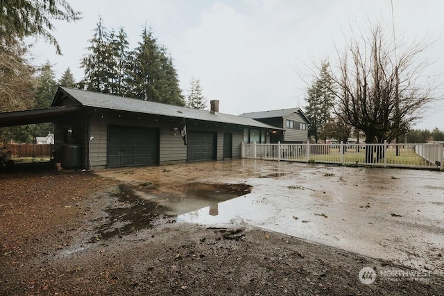 exterior space with a carport