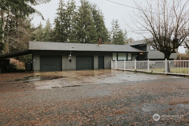 garage with a carport