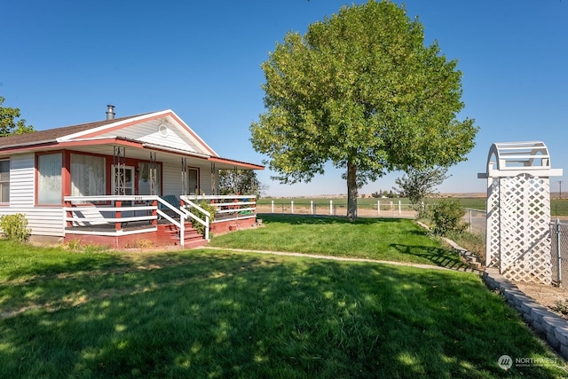 view of yard with a porch