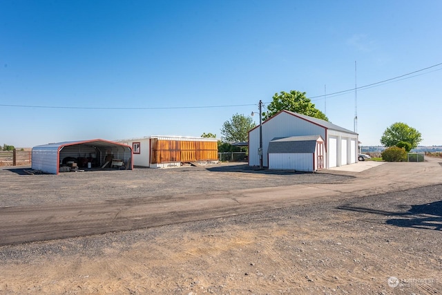 garage featuring a carport