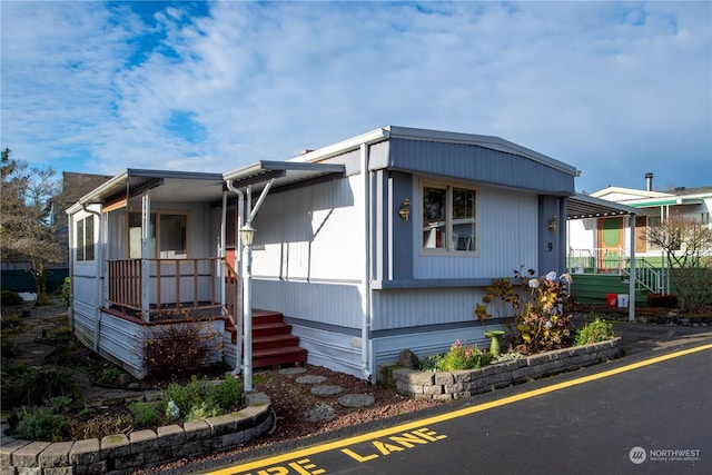 manufactured / mobile home with covered porch