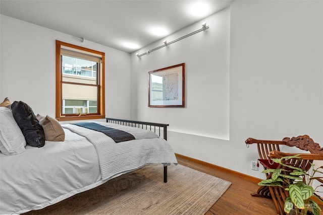 bedroom featuring hardwood / wood-style floors