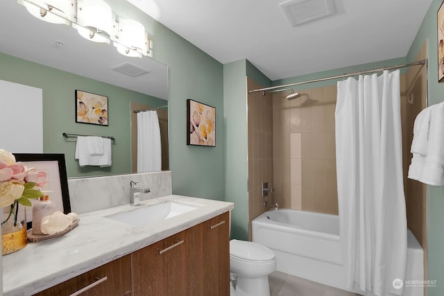 full bathroom featuring tile patterned floors, vanity, toilet, and shower / tub combo with curtain