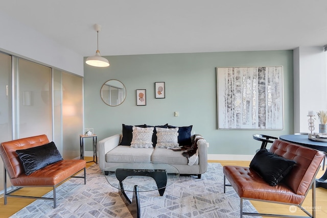 living room with light hardwood / wood-style floors