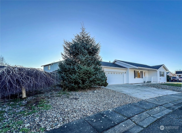 single story home with a garage