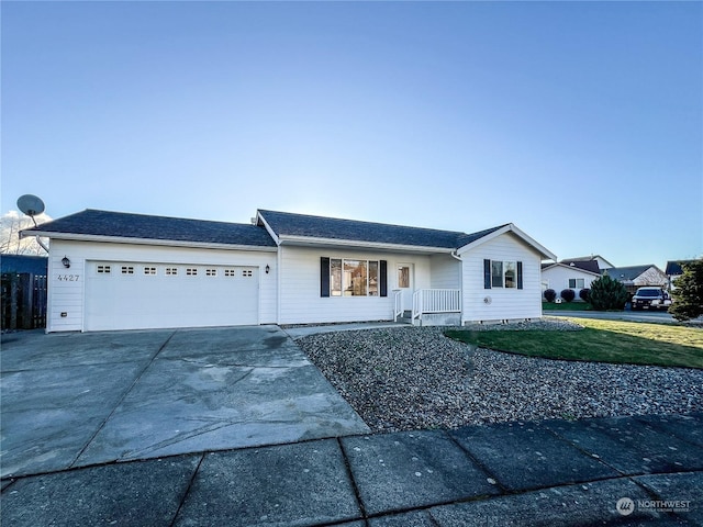 single story home with a garage