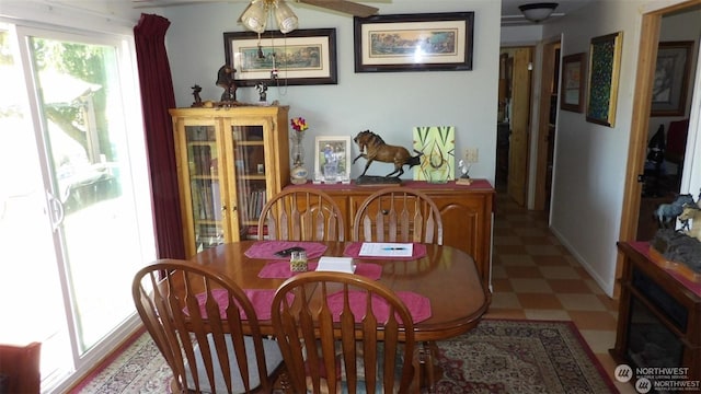 dining area with ceiling fan