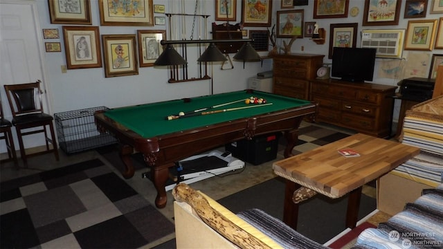 recreation room with a wall unit AC and billiards