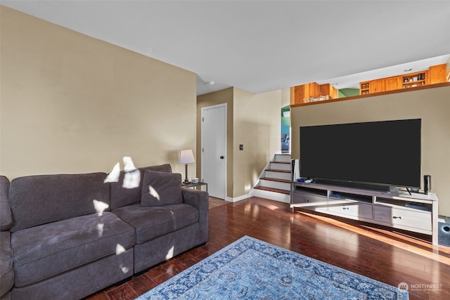 living room featuring dark hardwood / wood-style flooring