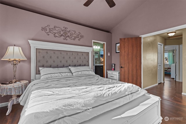 bedroom with lofted ceiling, dark hardwood / wood-style floors, connected bathroom, and ceiling fan