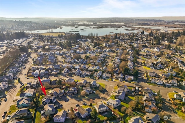 drone / aerial view featuring a water view