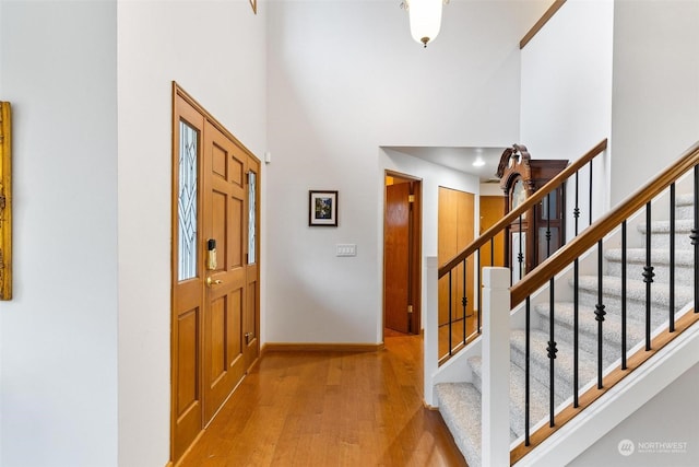 foyer with light hardwood / wood-style floors