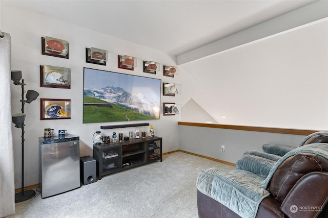 carpeted living room featuring vaulted ceiling with beams