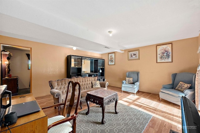 living room with wood-type flooring