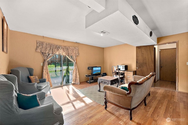 living room with light hardwood / wood-style floors