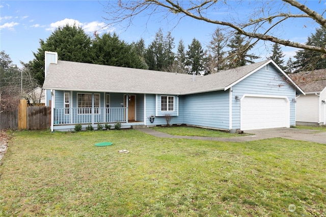 ranch-style house with covered porch, a garage, and a front lawn