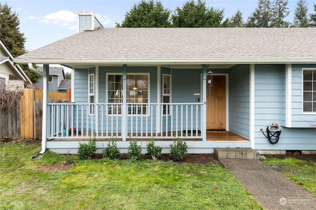 bungalow-style house with a front lawn