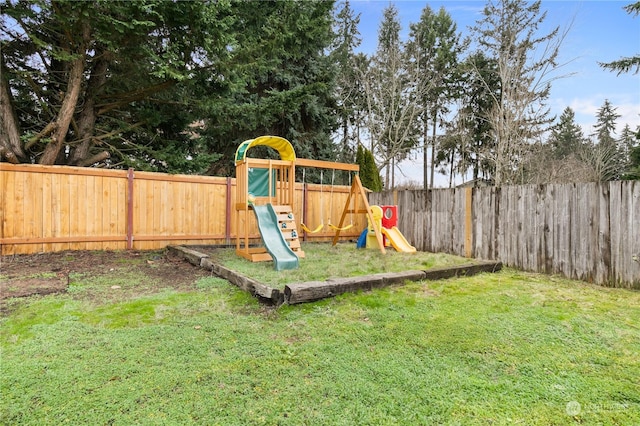 view of play area featuring a yard