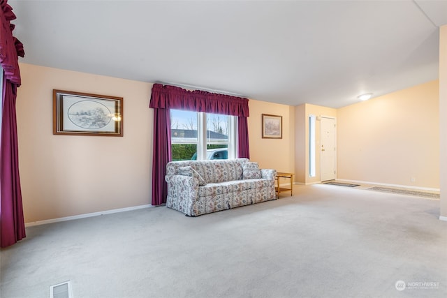 sitting room with light colored carpet