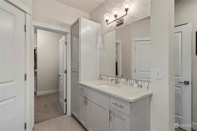 bathroom featuring tile patterned floors and vanity