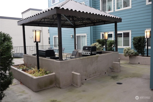 300 10th Ave Unit B-105, Seattle, WA 98122 - view of patio featuring a gazebo and a grill