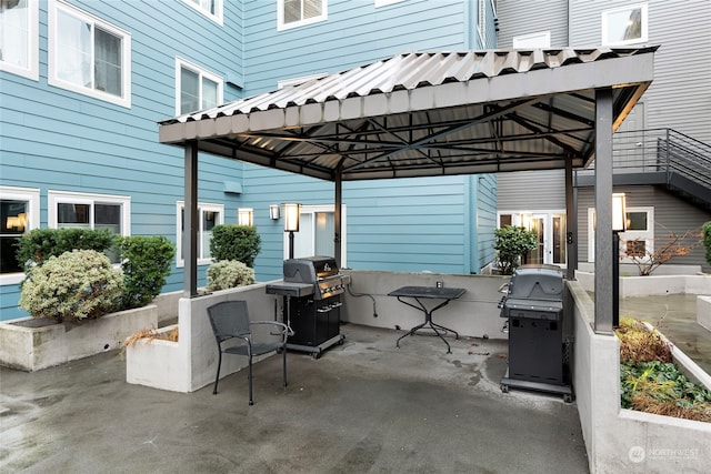 view of patio with a gazebo and a grill