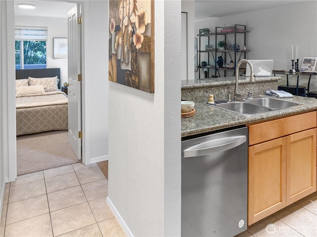 300 10th Ave Unit B-105, Seattle, WA 98122 - bar area featuring stainless steel dishwasher, a sink, light tile patterned flooring, baseboards, and light colored carpet