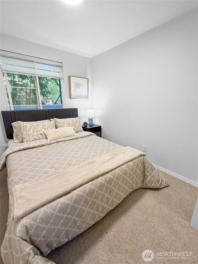 300 10th Ave Unit B-105, Seattle, WA 98122 - carpeted bedroom featuring baseboards