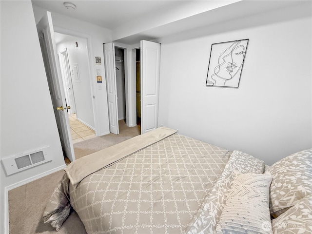 300 10th Ave Unit B-105, Seattle, WA 98122 - bedroom with carpet flooring and a closet