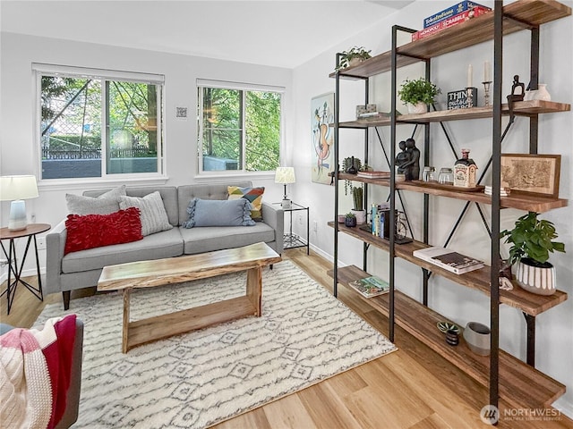 300 10th Ave Unit B-105, Seattle, WA 98122 - living area featuring wood finished floors and baseboards