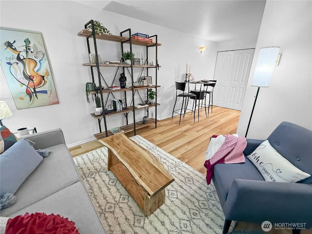 300 10th Ave Unit B-105, Seattle, WA 98122 - living area featuring wood finished floors and baseboards