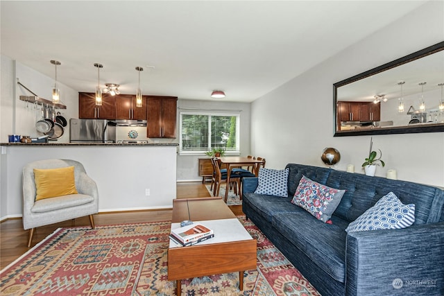 living room featuring dark hardwood / wood-style flooring